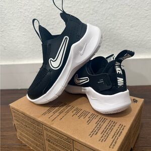 Nike Black and White Slip-On Sneakers